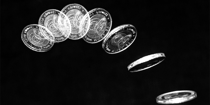 A timelapse of a coin being tossed