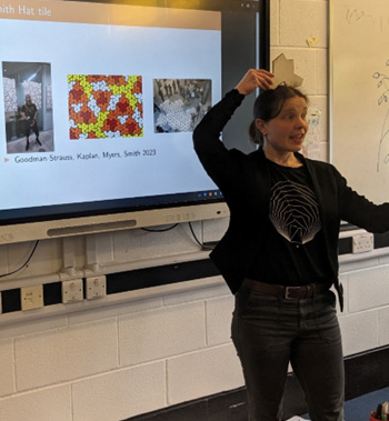 Dr Henna Koivusalo giving a presentation in a classroom