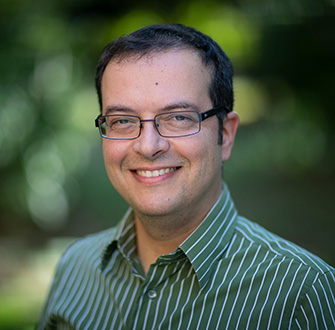 Gabriel Stylianides headshot with blurred background