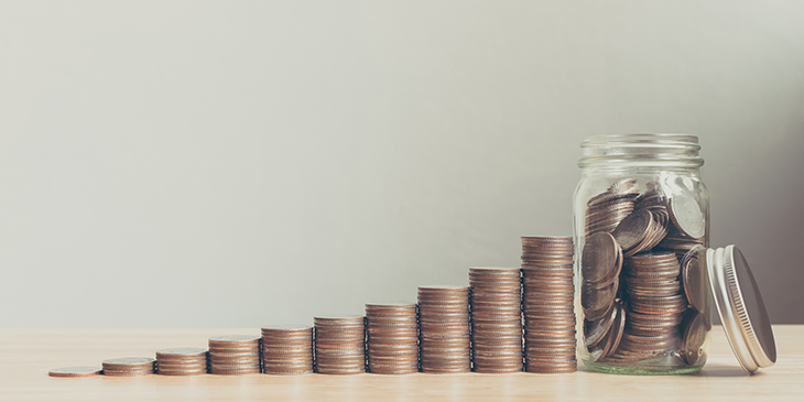 An increasing piles of coins with a final jar full of them