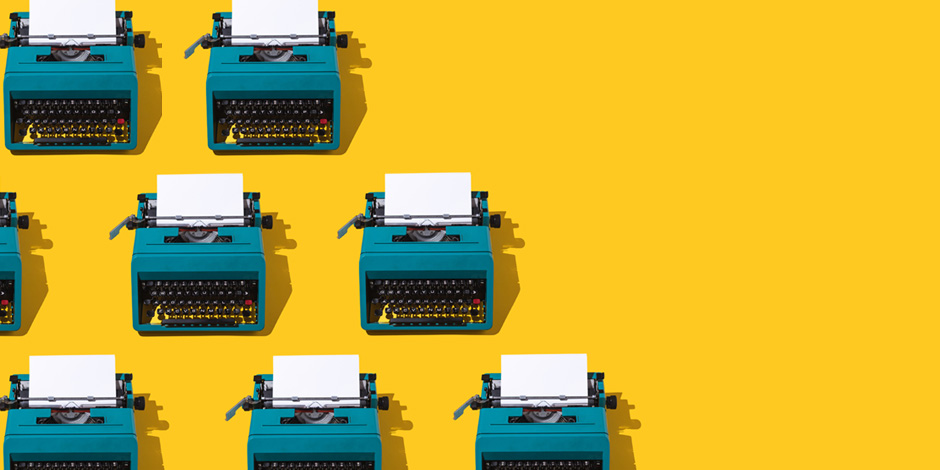 Pattern of green retro typewriters, with a blank page, on the left side, on a yellow background