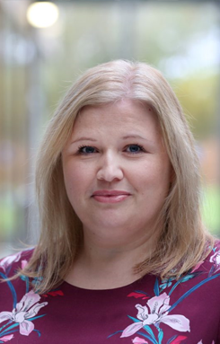 A close-up headshot photo of Dr Catherine Gripton