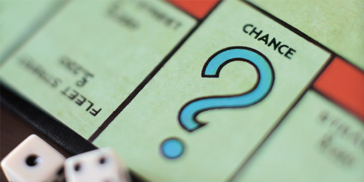 A close up shot of a Monopoly board Chance square
