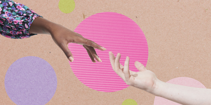 two hands reaching for each other, behind them in a brown paper texture background with coloured circles