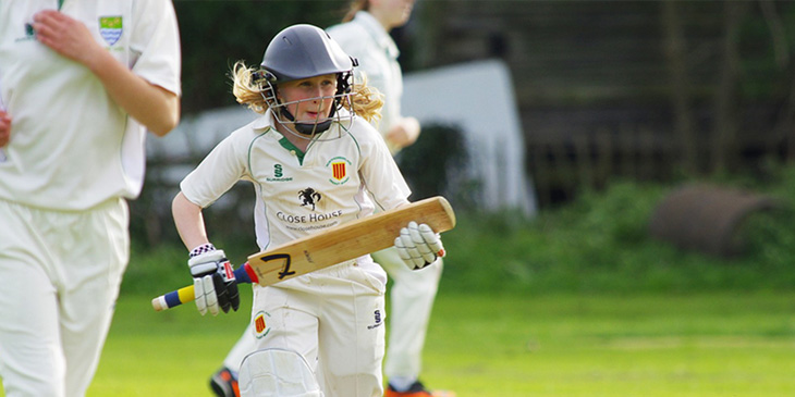 A cricket player running