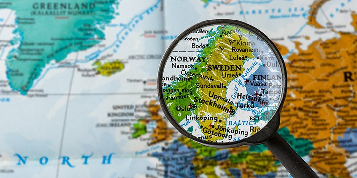 A map showing Scandinavian countries under a magnifying glass