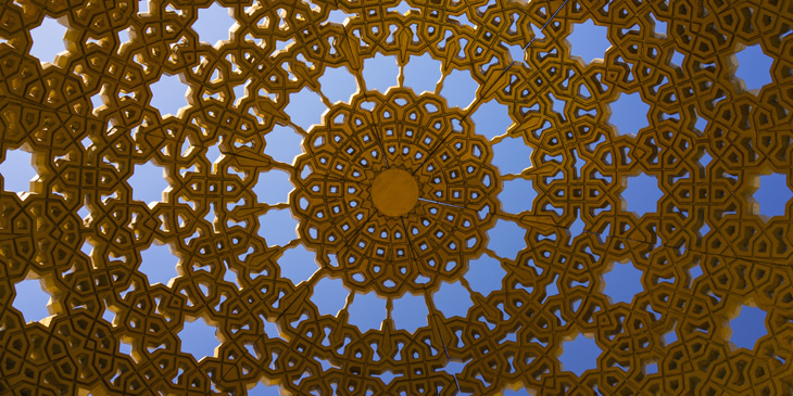 The golden decorative roof of a gazebo on the promenade at Muttrah, Muscat, Oman